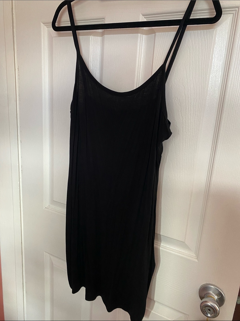 A lot of two Pretty Little Things black dress dresses